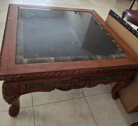Carved Wood Glass Top Coffee Table