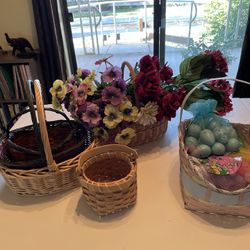 Several Baskets And Fake Flowers