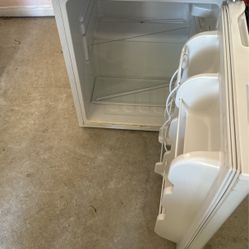 Mini Fridge Still Has Plastic On Door