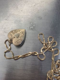 Solid 14kt gold heart shape locket with 20 inch permanent ( no clasps)box chain