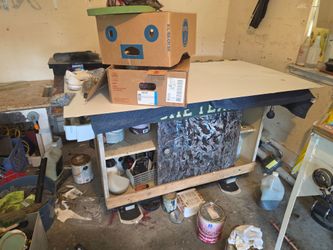 Shop table with sliding doors