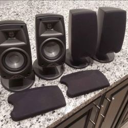 Four Klipsch Quintet III Speakers