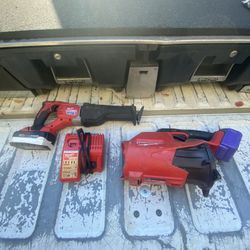 Milwaukee Sawzall 6.0 Battery And New Charger And Blower With Battery 