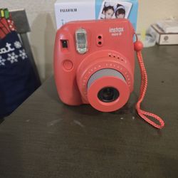 Gently Used INSTAX MINI 8. IN raspberry Orange 