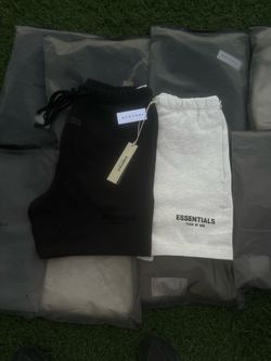 Essential shorts light oat and black.