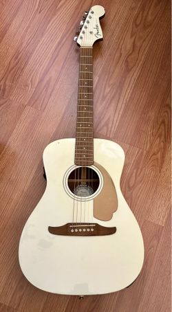Fender Malibu Fender Malibu Player ARG WN Acoustic Travel Guitar. Has brand new DAddario 11 to 52 gauge. Brand new 9 volt battery. Set up with low act