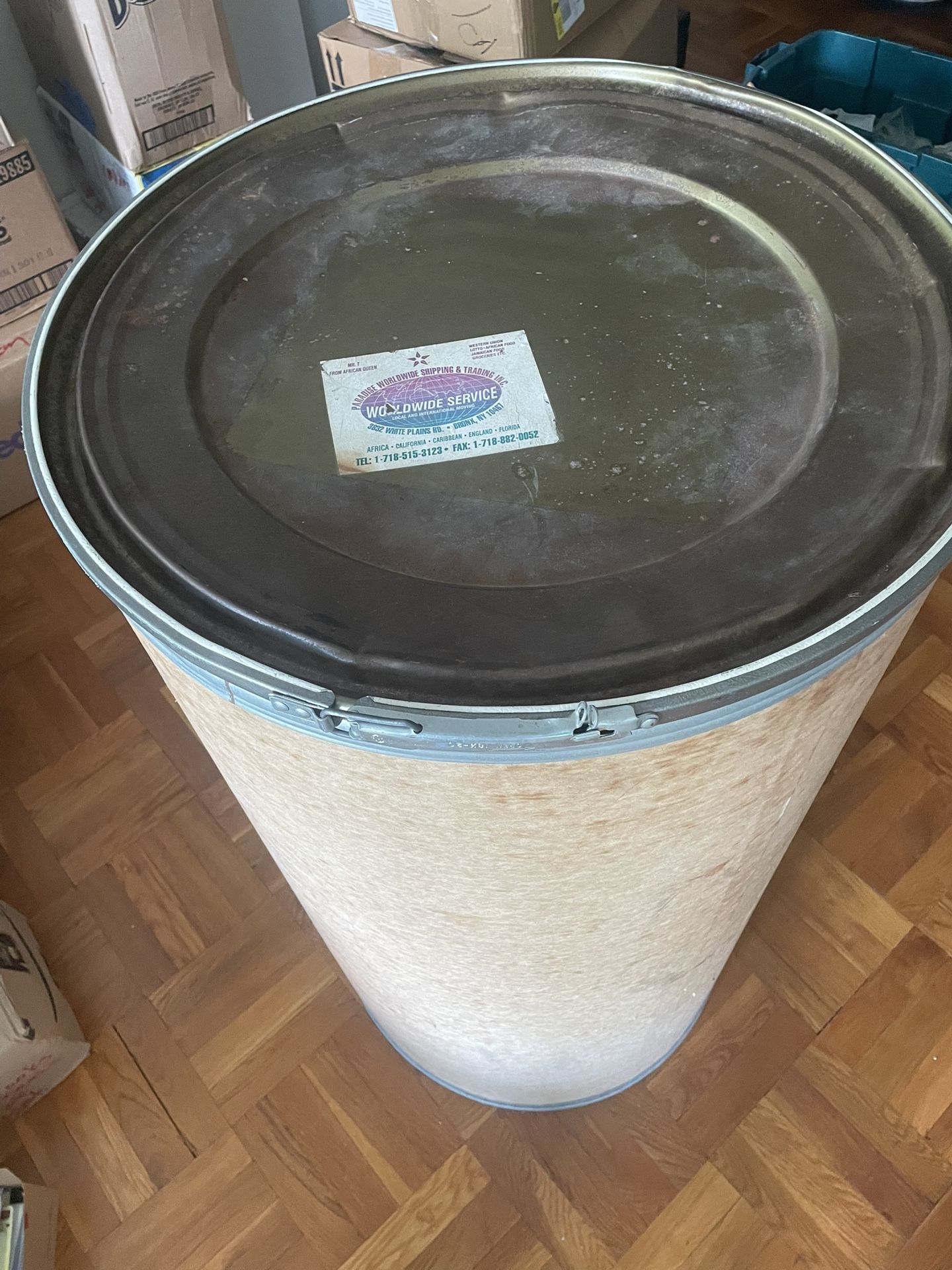 Shipping barrel 55 gallon heavy cardboard with sealable top.