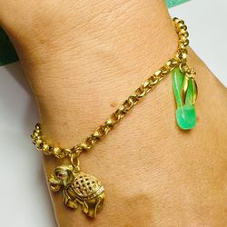 14k Gold Bracelet with charms