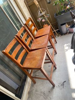 3 wooden high chairs
