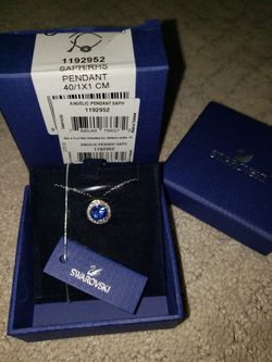 Necklace by Swarovski. Sapphire pendant with silver chain
