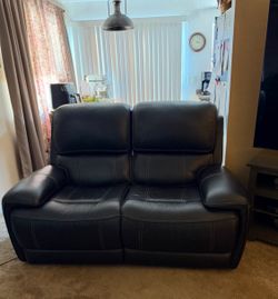 Excellent Condition - Living Spaces - Power Reclining Leather Sofa and Loveseat $800 or Best Offer