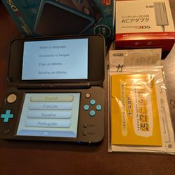 New 2DS XL (LL) in Box with 64Gb SD