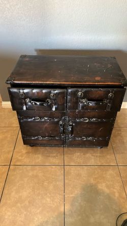 Brown faux leather cabinet