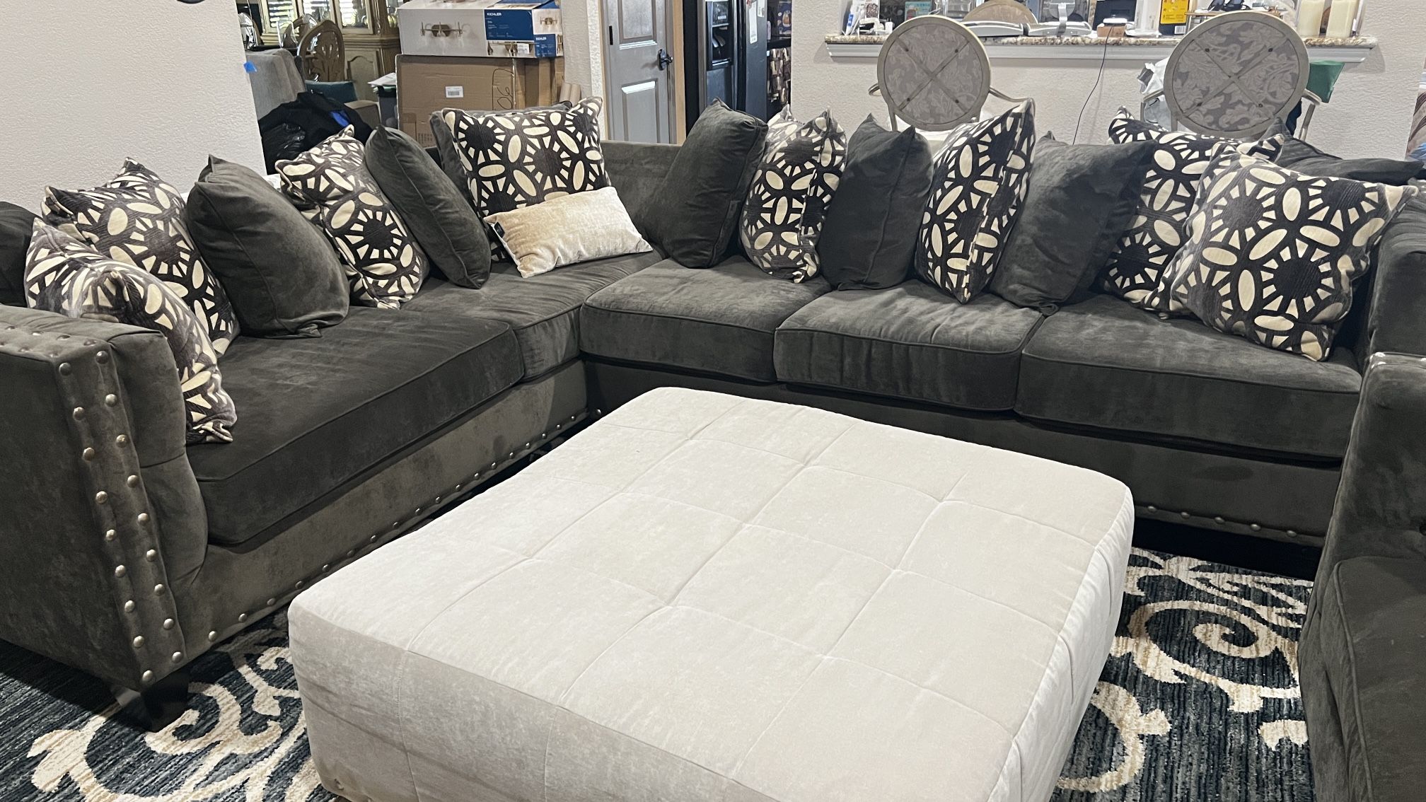 Gray Sectional, Ottoman, &  a Chair 1/2