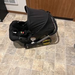 Doona car Seat & Stroller + Attachments 