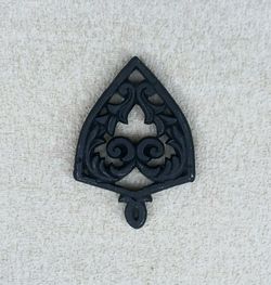 Vintage Cathedral-Style Cast Iron Trivet