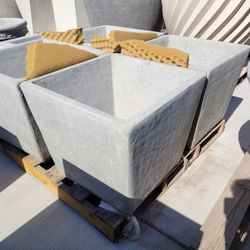CEMENT PLANTER POTS  $300 EACH