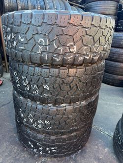 SET OF FOUR LT28565r18 TOYO AT3 TIRES
