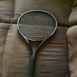 building participant Dominate the Court with Top-Tier Tennis Racquets!