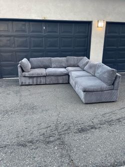 Grey modular section sofa