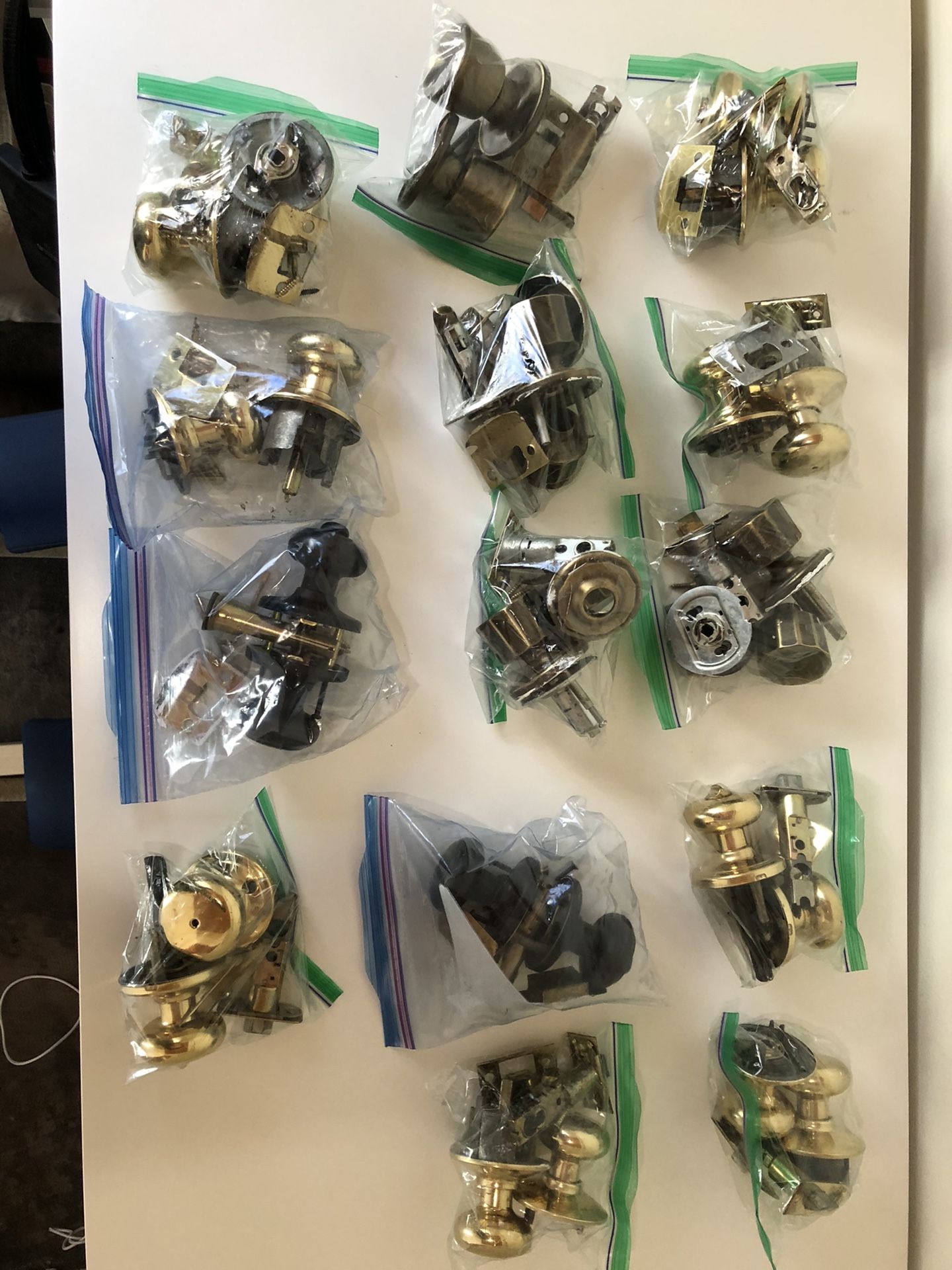 14 door knob sets with all the parts.