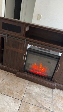 Heater and dresser and tv stand from Ashley’s furniture. Scratch but real Wood. I bought. It was slide. Eight. Hundred heater was separate, but giving