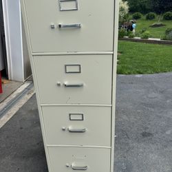 HDN Four Drawer Filing Cabinet. 52”H x 18” W X 26 1/2” D. Must Pick Up
