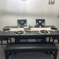 6 Person dining set with center that can be concealed to 6’ 