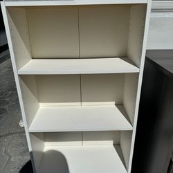 Like new white wooden 3-layer shelf bookcase .excellent condition.  10 inch deep x  23W x 40 H 