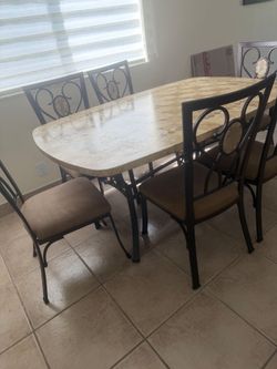 Dinning room table 6 chairs