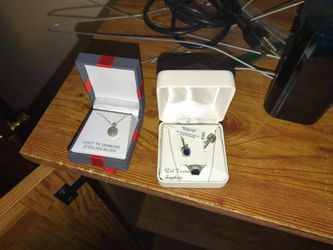 Necklace Rings And Another Necklace All Silver