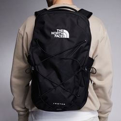 The North Face Women's Jester Luxe Backpack, featuring premium metallic accents on the logo and zipper pulls.