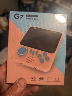Old school handheld gaming system. 200 games