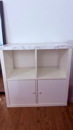 IKEA Kallax four cube shelving unit with cabinets & marble finish
