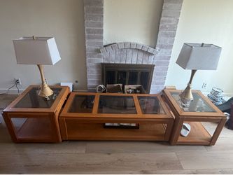 Oak coffee table and end table with glass tops.