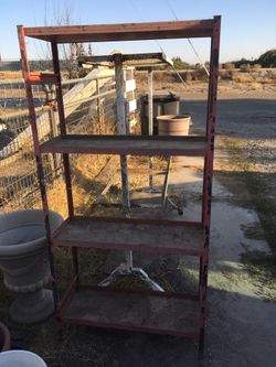 Vintage metal utility shelves