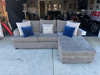 Gorgeous gray living spaces sectional couch !!