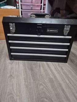 Metal box for tools with storage drawers.