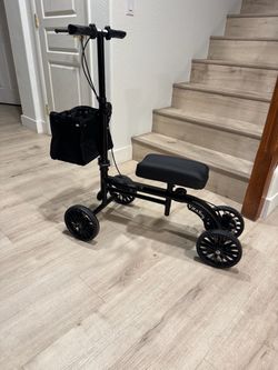 Brand new knee scooter walker with disc brake /Has front basket / adjustable