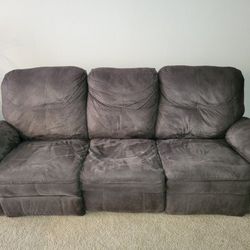 Reclining Couch, sit/stand desk, large office chair, large mirrors, Entertainment Center/tv Stand, coffee table.