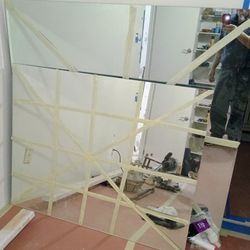 Two Mirrors And Two Medicine Cabinets