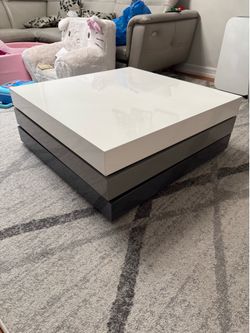 3-tone swivel coffee table with storage