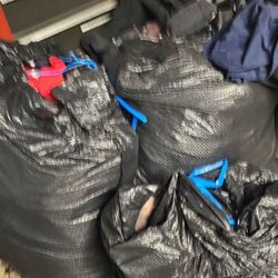 Black Bags Full Of Clothing