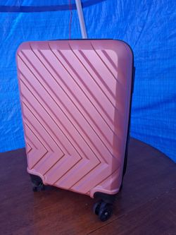 Salmon pink luggage