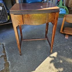 Table with built-in  Sewing  Machine