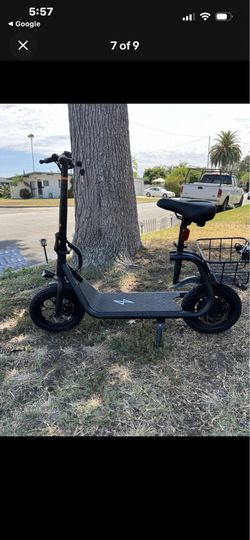 Seated Electric Scooter 450W Rear Hub Motor 12" Tires 20 Mile Range New