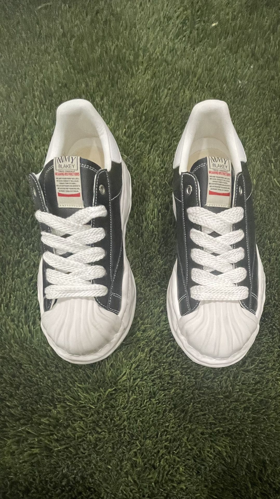 maison mihara yasuhiro blakey og sole leather low sneaker.