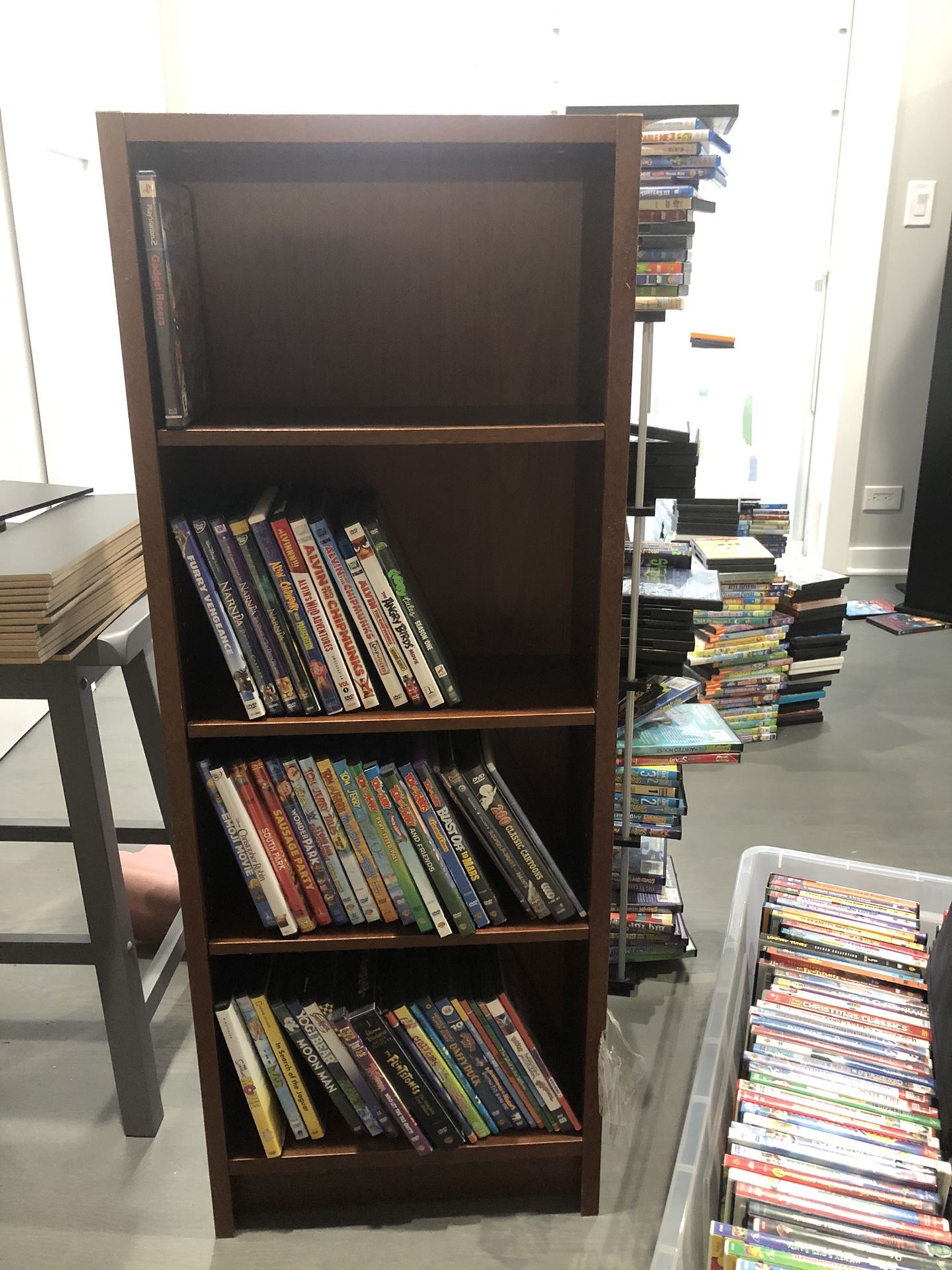 Small bookcase / DVDs / game storage.