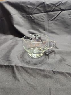 The selected item is a vintage Princess House Heritage Crystal Creamer featuring a clear glass body with an etched floral or leaf motif and a curved h