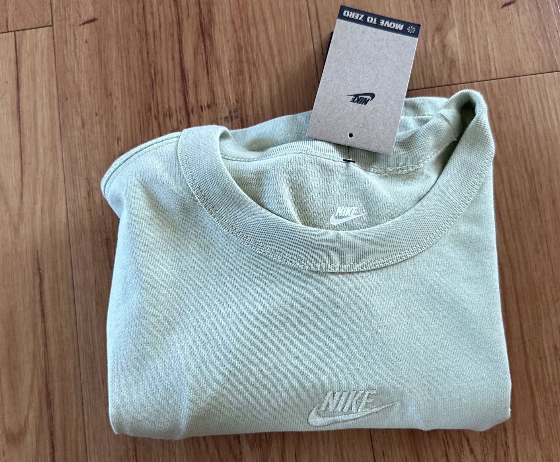 The Nike tee green nike spellout logo heavyweight shirt move to zero D07392-371